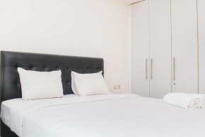 Fully Furnished with Cozy Design 2BR The Bellezza Apartment By Travelio